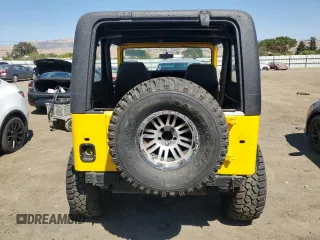 1992 Jeep Wrangler z VIN 2J4FY19P1NJ533862, wystawiony jako Copart lot #69116634 z przebiegiem 105 340 mil mil oraz Czysty tytuł • Clean title. Historia ofert i sprzedaży dostępna na DreamBid. Obrazek 6.