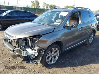 2017 Subaru Forester Touring z VIN JF2SJAWC9HH507636, wystawiony jako IAAI lot #41801988 z przebiegiem 32 030 mil mil oraz . Historia ofert i sprzedaży dostępna na DreamBid. Obrazek 2.