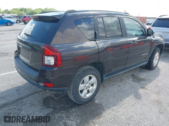 2014 Jeep Compass Sport with VIN 1C4NJCBA4ED626998, listed as a IAAI auction lot 42179793 with 109,059 mi miles. Bid and sale history available at carsss.com. Image 4.