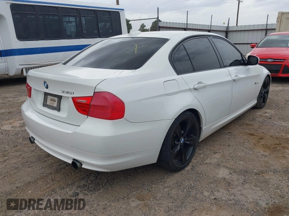 2011 BMW 3 Series 335i with VIN WBAPM5C54BE435453, listed as a IAAI auction lot 42048082 with 156,706 mi miles. Bid and sale history available at carsss.com. Image 4.