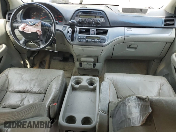 2007 Honda Odyssey EX-L with VIN 5FNRL38657B059033, listed as a Copart auction lot 54005495 with 212,674 mi miles and Salvage Title. Bid and sale history available at DreamBid. Image 8.
