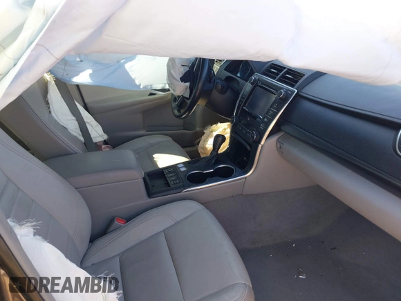 2015 Toyota Camry LE z VIN 4T1BD1FK9FU162556, wystawiony jako IAAI lot #41844806 z przebiegiem 183 263 mil mil oraz . Historia ofert i sprzedaży dostępna na DreamBid. Obrazek 5.