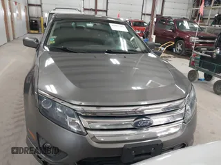 2010 Ford Fusion SE with VIN 3FAHP0HA8AR253165, listed as a IAAI auction lot 41887383 with 234,402 mi miles. Bid and sale history available at carsss.com. Image 12.