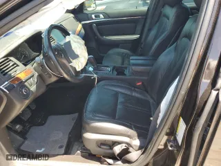 2013 Lincoln MKS with VIN 1LNHL9DK0DG615859, listed as a Copart auction lot 66994754 with 105,133 mi miles and Salvage Title. Bid and sale history available at carsss.com. Image 7.
