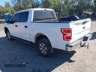 2018 Ford F-150 XL with VIN 1FTEW1CP0JKC28072, listed as a IAAI auction lot 41558764 with 153,402 mi miles. Bid and sale history available at carsss.com. Image 3.