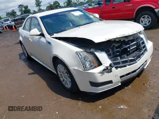 2012 Cadillac CTS Luxury with VIN 1G6DG5E57C0137409, listed as a IAAI auction lot 42633890 with 86,886 mi miles and . Bid and sale history available at DreamBid. Image 1.