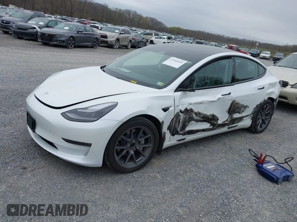 2021 Tesla Model 3 Long Range with VIN 5YJ3E1EBXMF980102, listed as a IAAI auction lot 41944364 with 48,766 mi miles and . Bid and sale history available at carsss.com. Image 17.