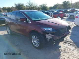 2010 Mazda CX-7 SV with VIN JM3ER2W56A0306252, listed as a IAAI auction lot 41327009 with 148,544 mi miles. Bid and sale history available at carsss.com. Image 1.