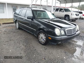 1998 Mercedes-Benz E-Class with VIN WDBJH65FXWA630428, listed as a IAAI auction lot 41074946 with 292,628 mi miles. Bid and sale history available at carsss.com. Image 1.