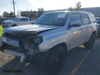 2015 Toyota 4Runner Limited with VIN JTEBU5JR6F5218586, listed as a IAAI auction lot 41594711 with 164,713 mi miles. Bid and sale history available at carsss.com. Image 2.