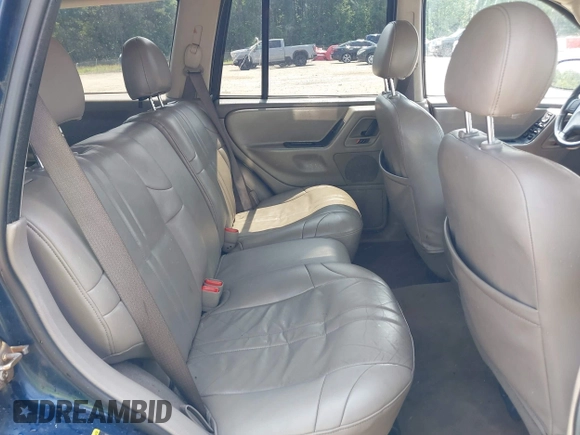 2002 Jeep Grand Cherokee Laredo with VIN 1J8GW48SX2C270339, listed as a IAAI auction lot 42390842 with Not provided miles and . Bid and sale history available at DreamBid. Image 8.