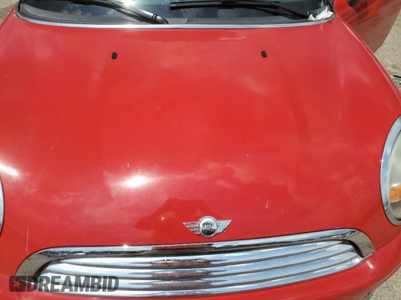 2013 MINI Hardtop with VIN WMWSU3C54DT687765, listed as a Copart auction lot 54677425 with Not Provided miles and Salvage Title. Bid and sale history available at DreamBid. Image 11.
