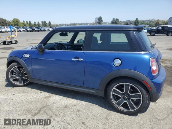 2013 MINI Hardtop S with VIN WMWSV3C53DT391200, listed as a Copart auction lot 59903365 with 48,654 mi miles and Salvage title. Bid and sale history available at DreamBid. Image 2.