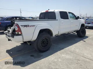 2014 Toyota Tacoma PreRunner with VIN 3TMKU4HN8EM041212, listed as a Copart auction lot 61948125 with 83,601 mi miles and Salvage title. Bid and sale history available at DreamBid. Image 3.