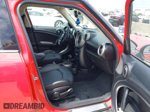 2011 MINI Countryman S z VIN WMWZC5C52BWL53856, wystawiony jako IAAI lot #42368316 z przebiegiem 107 318 mil mil oraz . Historia ofert i sprzedaży dostępna na DreamBid. Obrazek 5.