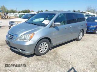 2010 Honda Odyssey EX with VIN 5FNRL3H43AB002674, listed as a IAAI auction lot 41769655 with 217,872 mi miles. Bid and sale history available at carsss.com. Image 2.