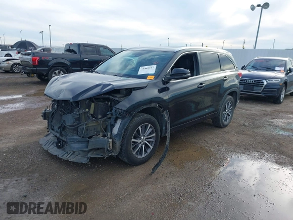 2017 Toyota Highlander XLE with VIN 5TDKZRFH9HS509478, listed as a IAAI auction lot 41448617 with 131,839 mi miles and . Bid and sale history available at DreamBid. Image 2.