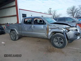 2017 Toyota Tacoma SR5 with VIN 3TMDZ5BN3HM025433, listed as a IAAI auction lot 41058797 with 68,355 mi miles and . Bid and sale history available at DreamBid. Image 14.