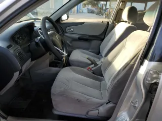 2002 Mazda Protege DX with VIN JM1BJ225120605237, listed as a Copart auction lot 49331225 with 184,556 mi miles and Salvage Title. Bid and sale history available at DreamBid. Image 7.