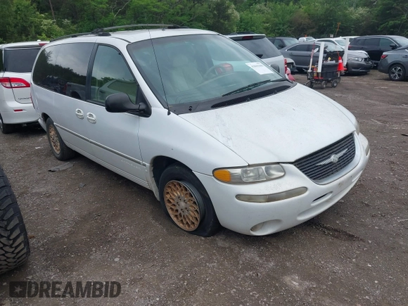 1998 Chrysler Town & Country LXi with VIN 1C4GP64L9WB664179, listed as a IAAI auction lot 42041600 with Not Provided miles. Bid and sale history available at carsss.com. Image 1.