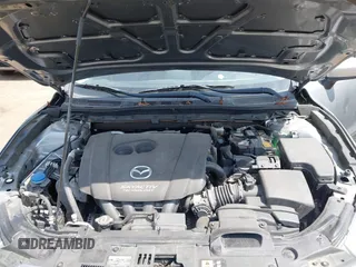2014 Mazda 3 i Touring with VIN JM1BM1L70E1185972, listed as a IAAI auction lot 42005779 with 90,175 mi miles and . Bid and sale history available at DreamBid. Image 10.