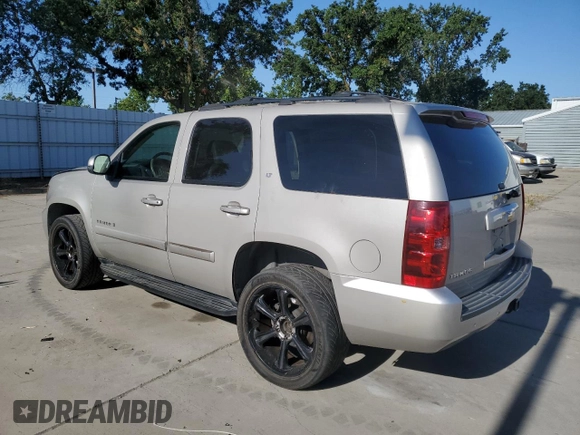2007 Chevrolet Tahoe LT with VIN 1GNFC13J17J145992, listed as a Copart auction lot 57673385 with 151,804 mi miles and Salvage title. Bid and sale history available at DreamBid. Image 2.