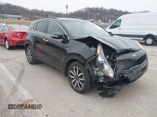 2018 Kia Sportage EX z VIN KNDPNCAC8J7352407, wystawiony jako IAAI lot #41559097 z przebiegiem 64 170 mil mil oraz . Historia ofert i sprzedaży dostępna na DreamBid. Obrazek 1.