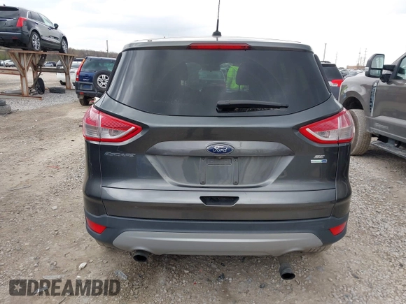 2016 Ford Escape SE with VIN 1FMCU9GX8GUB21396, listed as a IAAI auction lot 41940242 with 123,943 mi miles. Bid and sale history available at carsss.com. Image 17.