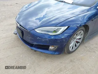2016 Tesla Model S 90D with VIN 5YJSA1E4XGF168165, listed as a IAAI auction lot 42220139 with Not provided miles and . Bid and sale history available at DreamBid. Image 6.