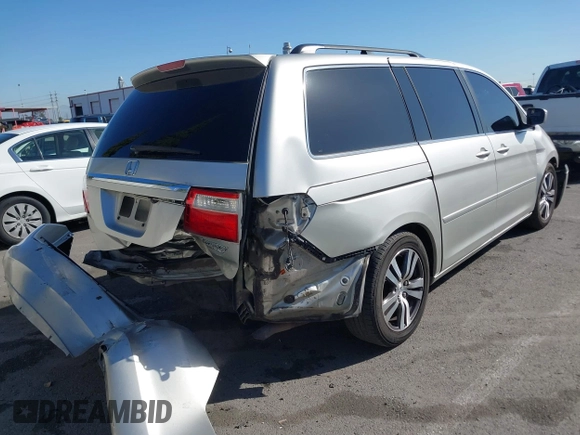 2005 Honda Odyssey TOURING with VIN 5FNRL38865B128519, listed as a IAAI auction lot 41830182 with 171,010 mi miles. Bid and sale history available at carsss.com. Image 4.