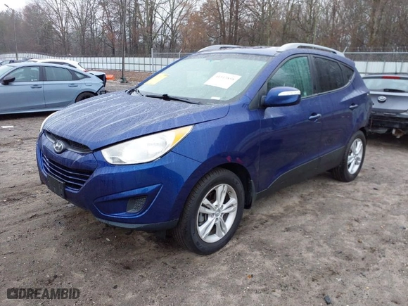 2012 Hyundai Tucson Limited with VIN KM8JU3AC1CU534989, listed as a IAAI auction lot 41513858 with 133,660 mi miles. Bid and sale history available at carsss.com. Image 2.