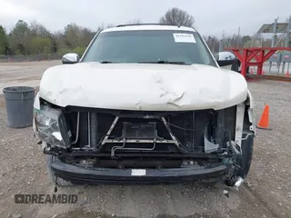 2014 Chevrolet Tahoe LTZ z VIN 1GNSCCE05ER101331, wystawiony jako IAAI lot #41793150 z przebiegiem 177 769 mil mil oraz . Historia ofert i sprzedaży dostępna na DreamBid. Obrazek 12.
