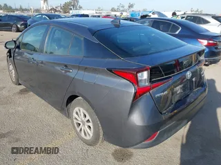 2022 Toyota Prius L Eco with VIN JTDKAMFUXN3188930, listed as a IAAI auction lot 42275661 with 116,934 mi miles and . Bid and sale history available at DreamBid. Image 3.