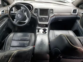 2014 Jeep Grand Cherokee Overland with VIN 1C4RJECG1EC556155, listed as a Copart auction lot 75641034 with 116,549 mi miles and Salvage Title. Bid and sale history available at carsss.com. Image 8.