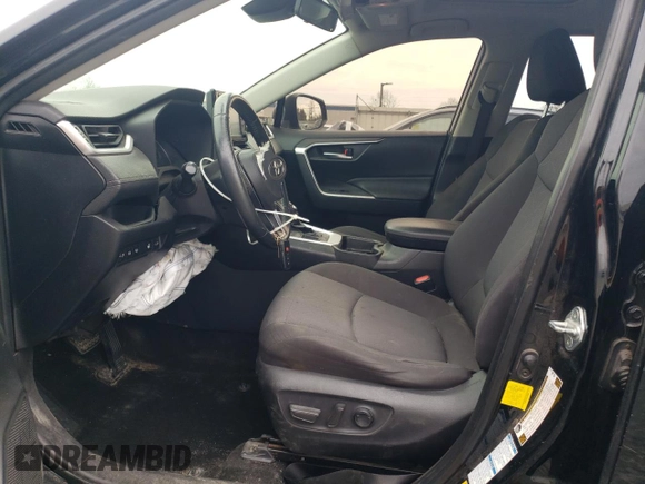 2019 Toyota RAV4 XLE with VIN JTMP1RFV9KD506960, listed as a Copart auction lot 50242025 with 102,157 mi miles and Salvage Title. Bid and sale history available at DreamBid. Image 7.