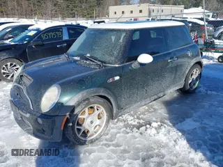 2003 MINI Hardtop S z VIN WMWRE33473TD72981, wystawiony jako IAAI lot #41599521 z przebiegiem 97 403 mil mil oraz . Historia ofert i sprzedaży dostępna na DreamBid. Obrazek 18.