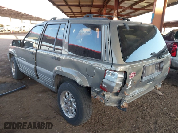 1998 Jeep Grand Cherokee Laredo with VIN 1J4GZ58S9WC136684, listed as a IAAI auction lot 41444103 with 1 mi miles. Bid and sale history available at carsss.com. Image 3.