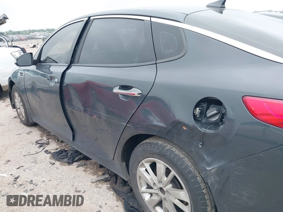 2016 Kia Optima LX z VIN KNAGT4L30G5070000, wystawiony jako IAAI lot #42169747 z przebiegiem 267 498 mil mil oraz . Historia ofert i sprzedaży dostępna na DreamBid. Obrazek 17.