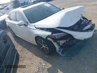 2024 Honda Civic Touring z VIN 2HGFE1F96RH323745, wystawiony jako IAAI lot #42147431 z przebiegiem 22 113 mil mil oraz . Historia ofert i sprzedaży dostępna na DreamBid. Obrazek 1.