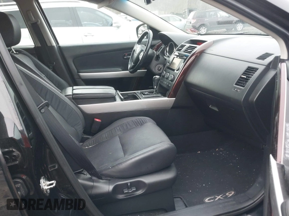 2015 Mazda CX-9 Grand Touring z VIN JM3TB3DV6F0464926, wystawiony jako IAAI lot #42035670 z przebiegiem 168 257 mil mil oraz . Historia ofert i sprzedaży dostępna na DreamBid. Obrazek 5.