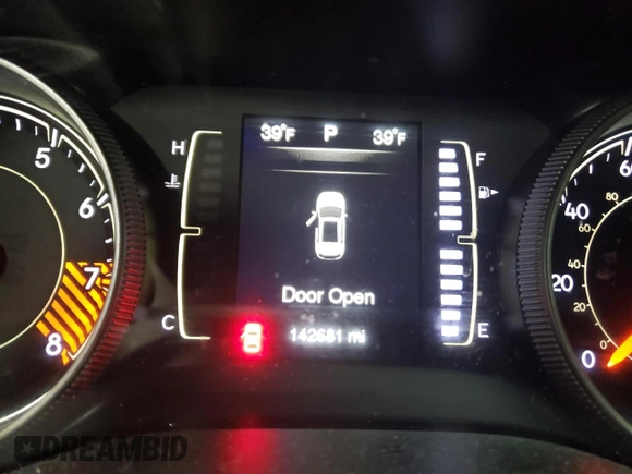 2015 Jeep Cherokee Latitude with VIN 1C4PJMCS5FW624799, listed as a Copart auction lot 52339795 with 142,681 mi miles and Salvage Title. Bid and sale history available at DreamBid. Image 9.