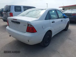 2005 Ford Focus S with VIN 1FAFP34N85W245314, listed as a IAAI auction lot 42680320 with 249,306 mi miles and . Bid and sale history available at DreamBid. Image 4.
