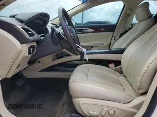 2015 Lincoln MKZ z VIN 3LN6L2J90FR601908, wystawiony jako Copart lot #55516355 z przebiegiem 127 487 mil mil oraz Szkoda całkowita • Salvage title. Historia ofert i sprzedaży dostępna na DreamBid. Obrazek 7.
