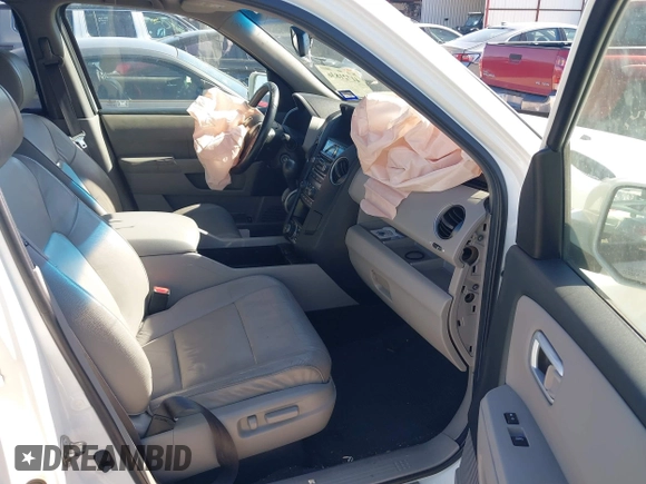 2012 Honda Pilot Touring with VIN 5FNYF3H91CB020673, listed as a IAAI auction lot 41721836 with 123,607 mi miles and . Bid and sale history available at carsss.com. Image 5.