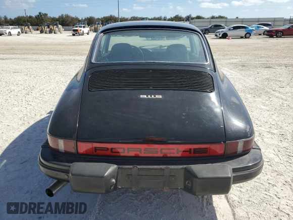1975 Porsche 911 with VIN 9115202267, listed as a Copart auction lot 75863884 with 61,298 mi miles and Salvage title. Bid and sale history available at DreamBid. Image 6.