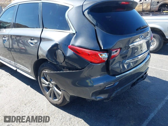 2013 Infiniti JX35 with VIN 5N1AL0MM8DC317601, listed as a IAAI auction lot 40678694 with 142,221 mi miles and . Bid and sale history available at DreamBid. Image 6.