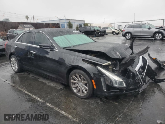 2015 Cadillac CTS Luxury RWD with VIN 1G6AR5SX4F0112846, listed as a Copart auction lot 86816684 with 86,025 mi miles and Salvage Title. Bid and sale history available at DreamBid. Image 4.