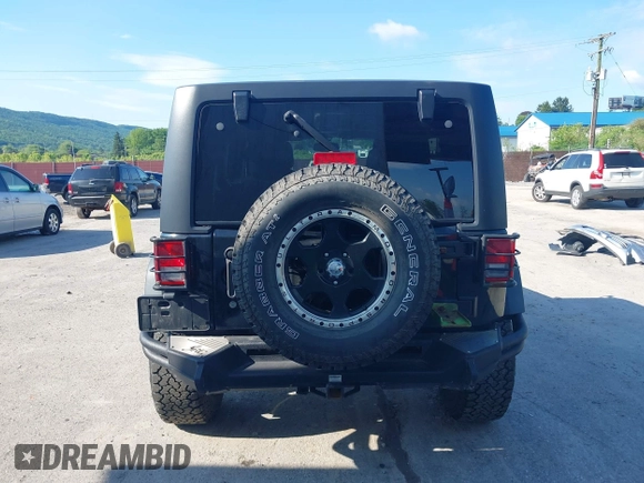 2013 Jeep Wrangler Unlimited Sport z VIN 1C4HJWDG9DL510121, wystawiony jako IAAI lot #42389944 z przebiegiem 84 390 mil mil oraz . Historia ofert i sprzedaży dostępna na DreamBid. Obrazek 16.