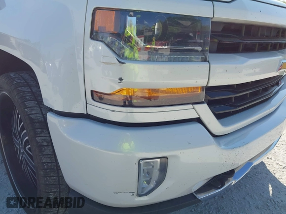 2017 Chevrolet Silverado 1500 LT with VIN 3GCUKREC4HG364108, listed as a IAAI auction lot 42050014 with 148,691 mi miles and . Bid and sale history available at DreamBid. Image 6.