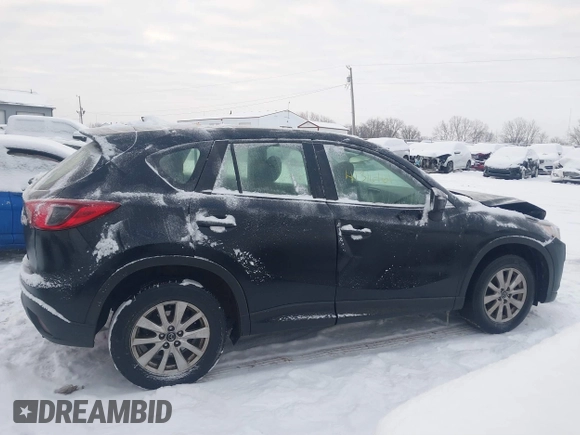 2016 Mazda CX-5 Sport z VIN JM3KE4BY0G0919017, wystawiony jako IAAI lot #41316161 z przebiegiem 209 259 mil mil oraz . Historia ofert i sprzedaży dostępna na DreamBid. Obrazek 13.